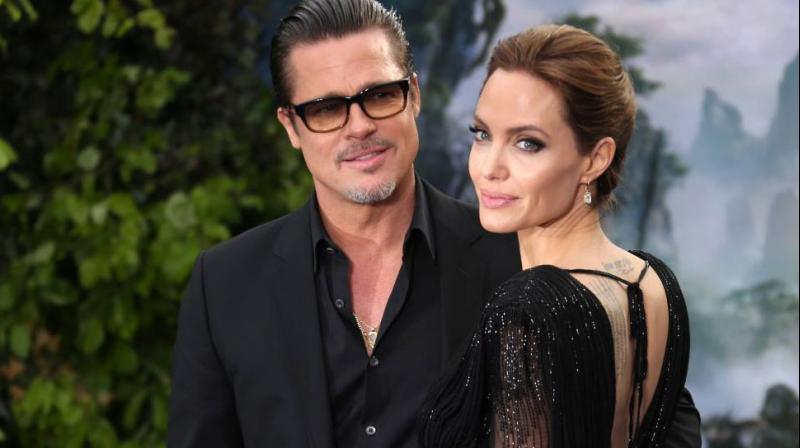 Brad Pitt y Angelina Jolie en un evento