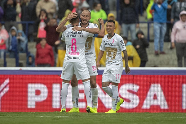 González celebra uno de sus goles contra Tigres