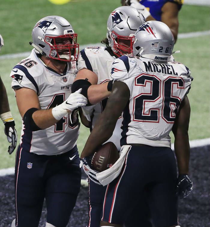 Los Pats festejan anotación de Sony Michel