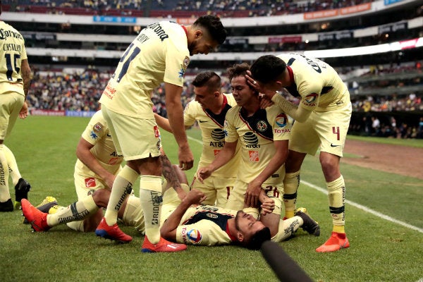 América celebra una anotación ante Puebla 