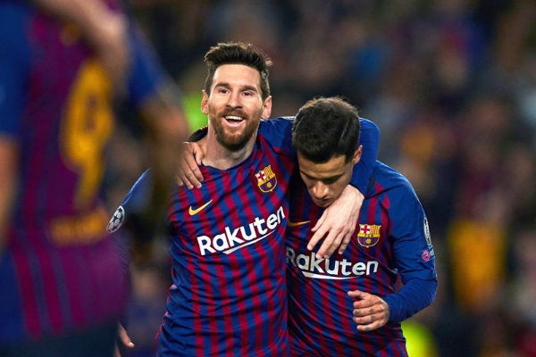 Messi y Coutinho durante un partido