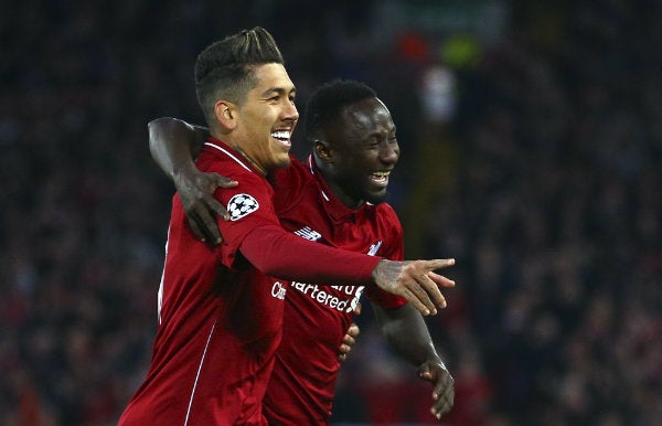 Keita y Firmino celebran una anotación ante los Dragones 