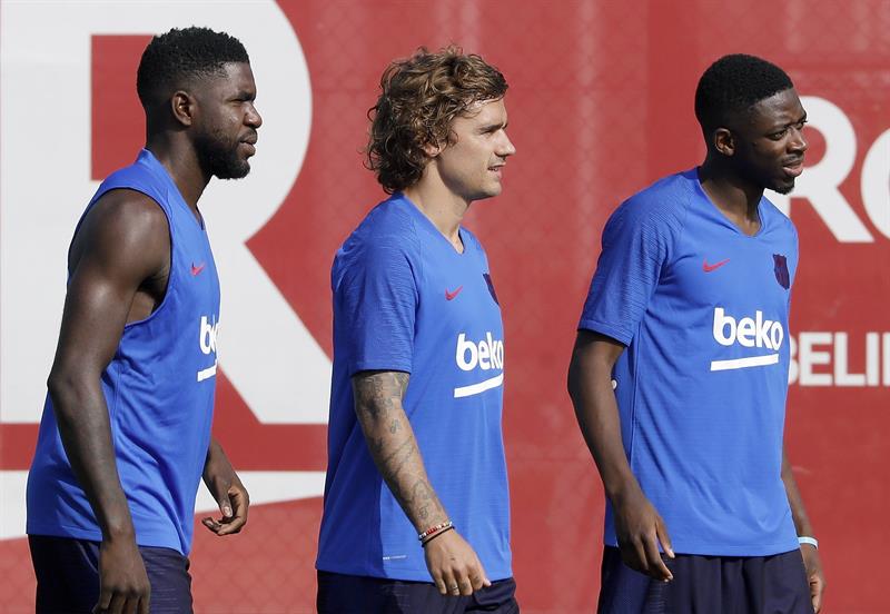 Umtiti, Griezmann y Dembélé, en una práctica de los culés