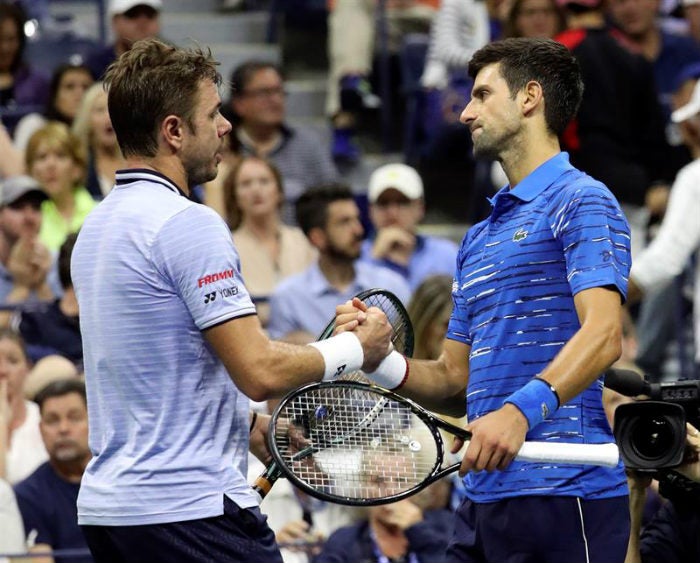 Wawrinka y Djokovic, durante un partido