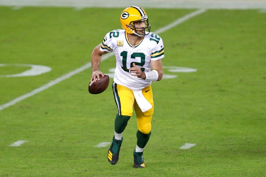 Aaron Rodgers en acción vs 49ers