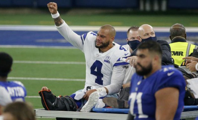 Prescott al salir lesionado en la temporada pasada