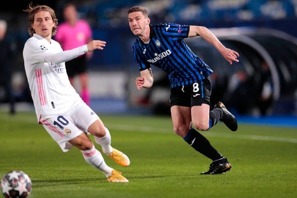 Luka Modric en acción contra Atalanta en Champions League