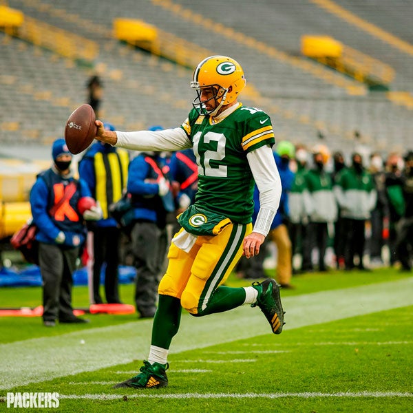 El quarterback anotando un touchdown con los Packers