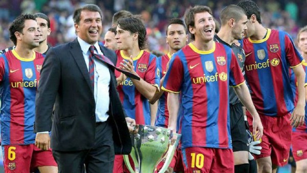Laporta y Messi tras un título del Barcelona 