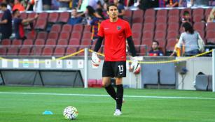 Ochoa en calentamiento con el Málaga