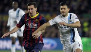 Messi y Agüero en un duelo de Champions League