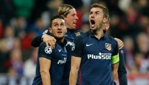 Jugadores del Atlético celebran el gol de Griezmann