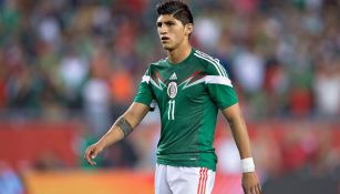 Alan Pulido, durante un partido con la Selección Mexicana