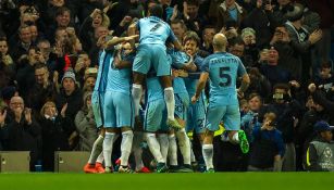 Jugadores del Manchester City celebran un gol contra Barcelona