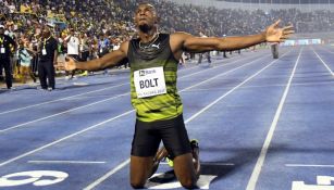 Usain Bolt festeja una victoria en una prueba de atletismo