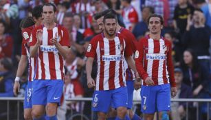 Jugadores del Atlético de Madrid celebran una anotación