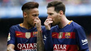 Messi y Neymar, durante un juego con el Barcelona