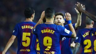 Suárez celebra su anotación con Messi 