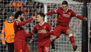 Jugadores del Liverpool, tras marcar en la goleada contra Spartak