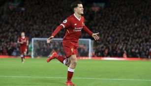 Philippe Coutinho celebra un gol contra el Swansea City