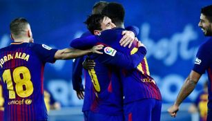 Messi celebra un gol con sus compañeros