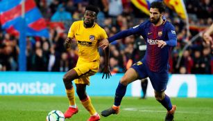 André disputa un balón en Camp Nou