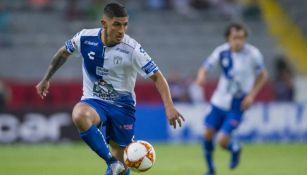 Víctor Guzmán durante el partido contra Atlas