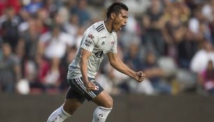 Osvaldo Martínez festeja gol con el Atlas