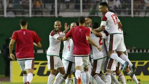Jugadores de Marruecos celebran anotación 