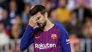 Gerard Pique en acción con Barcelona