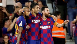 Vidal, Suárez y Messi durante un duelo con el Barcelona 