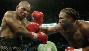 Lennox Lewis en pelea frente a Mike Tyson