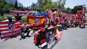 Hinchas del Atlético de Madrid en la Fuente de Cibeles
