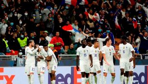 Jugadores franceses celebran gol vs España