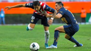 Cisneros y Cispa en el partido de Chivas vs Pumas en el Repechaje