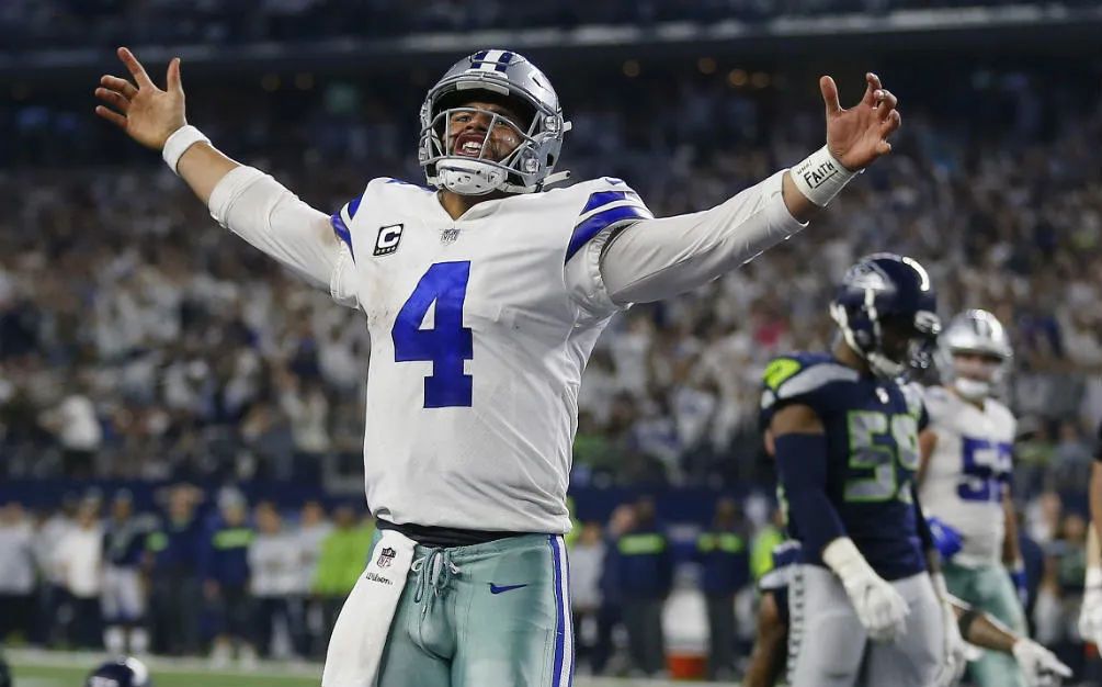 AP Dak Prescott festeja un touchdown en contra de Seattle