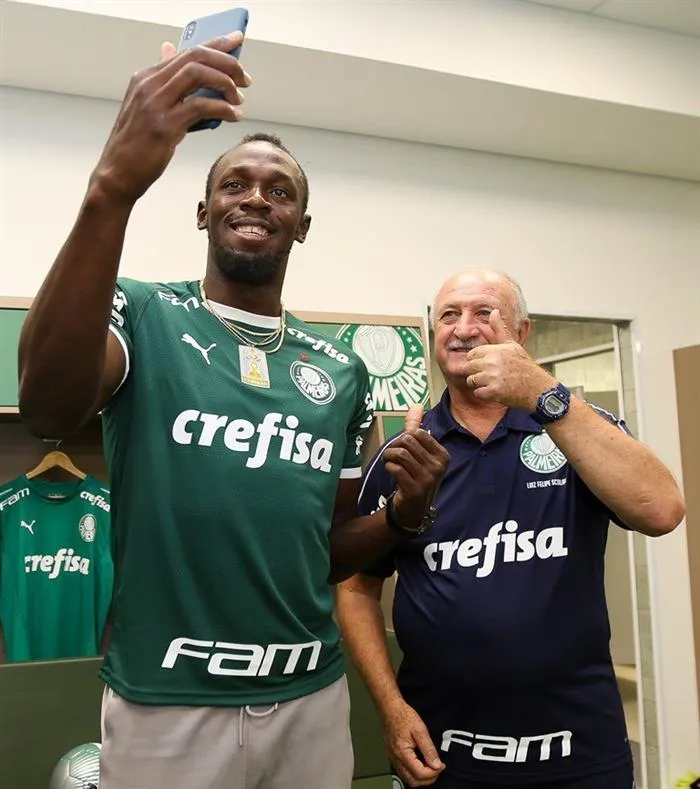 EFE Usain Bolt y Scolari, posan para la fotografía