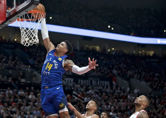 AP Gary Harris, a punto de encestar