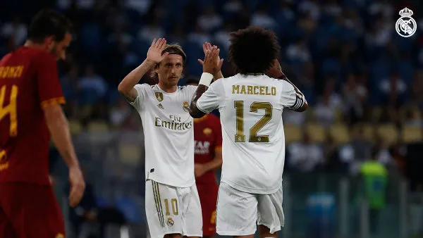 TWITTER @REALMADRID Marelo celebrando su anotación con Luka Modric