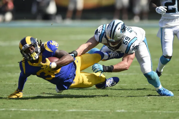 AP Luke Kuechly taclea Todd Gurley
