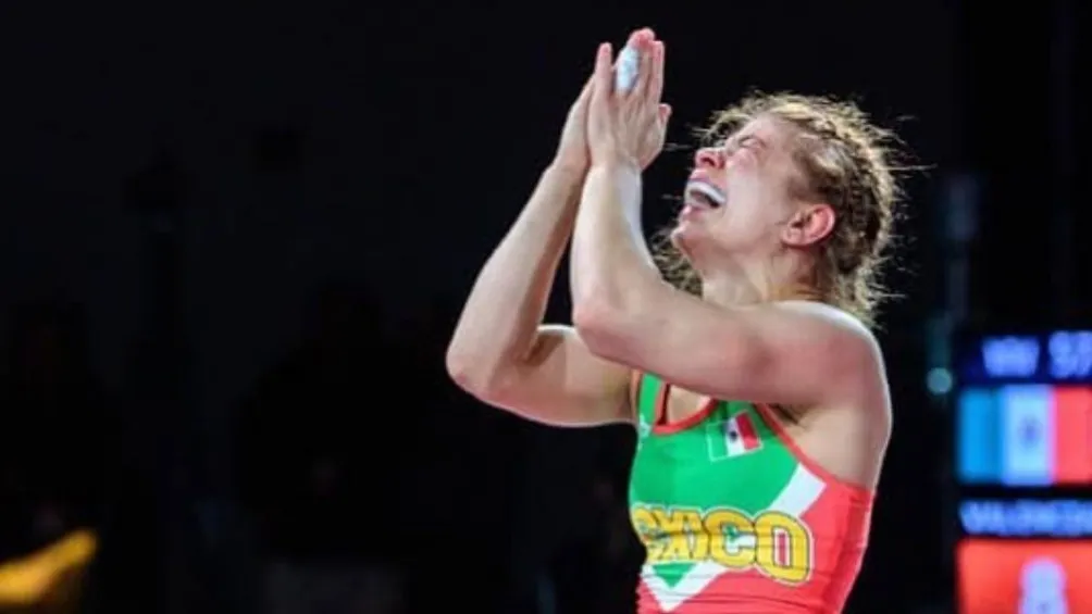 TWITTER: @CONADE Jane Valencia celebrando tras una lucha