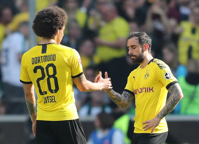 Axel Witsel y Paco Alcácer en un juego del Borussia Dortmund