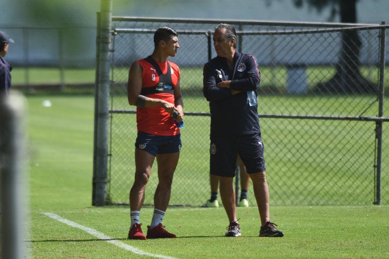 Pulido habla con Tomás Boy en una práctica