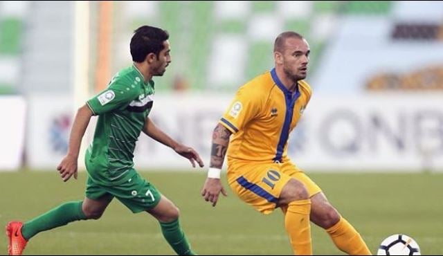 Wesley Sneijder, en un juego con el Al-Gharafa