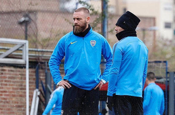 Daniele de Rossi y Carlos Tévez durante un entrenamiento