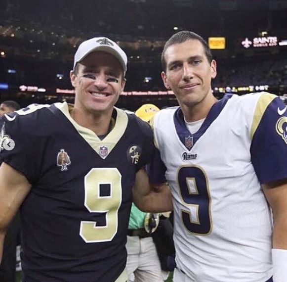 Drew Brees y Luis Pérez