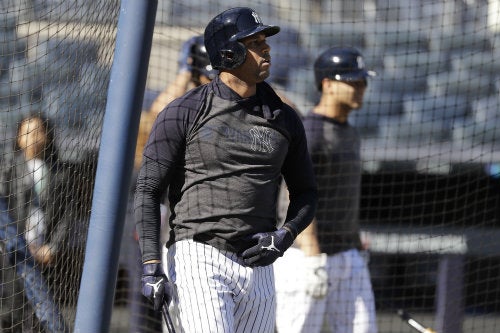 Aron Hicks antes de un juego de los Yankees