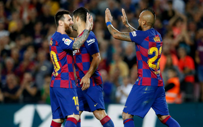 Messi y Vidal, en festejo de gol