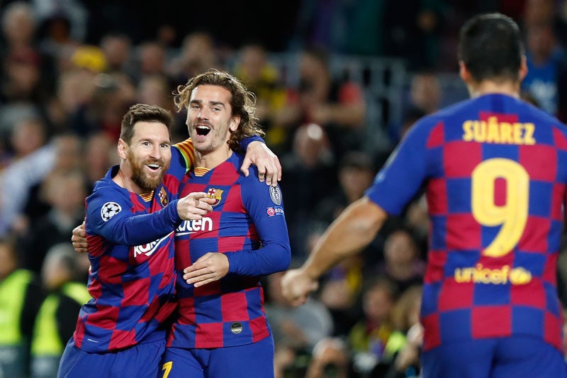 Messi festeja con Griezmann