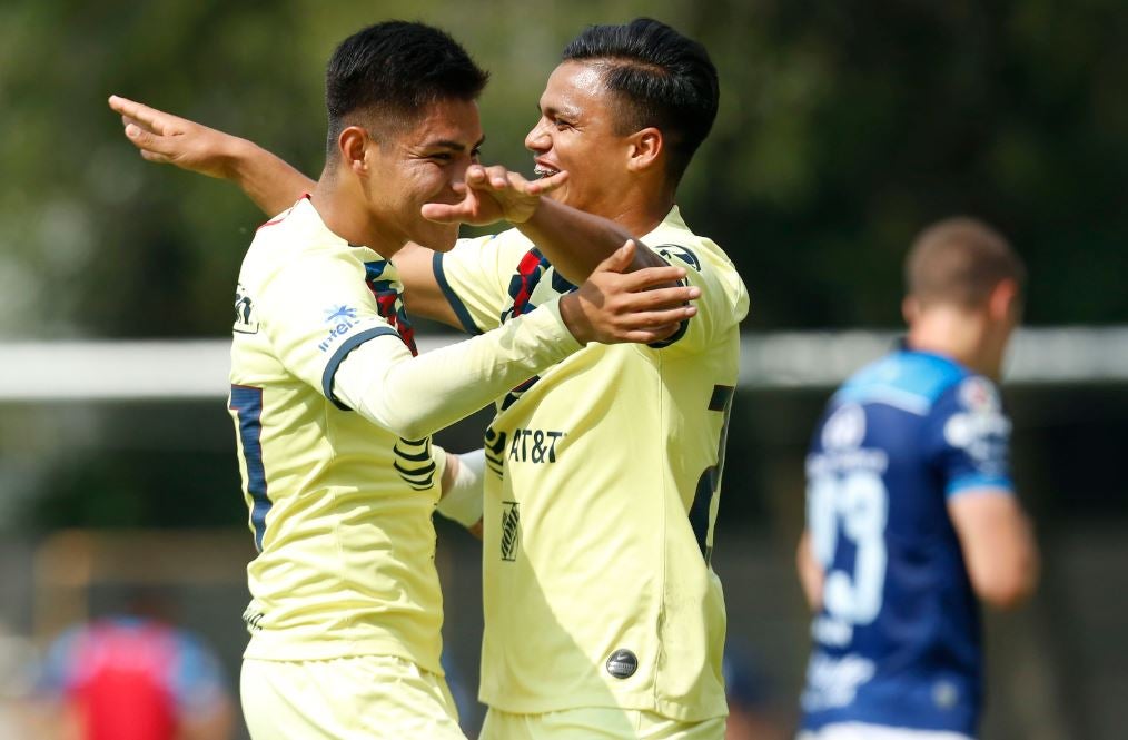 Abraham Padilla y Roman Martinez en festejo